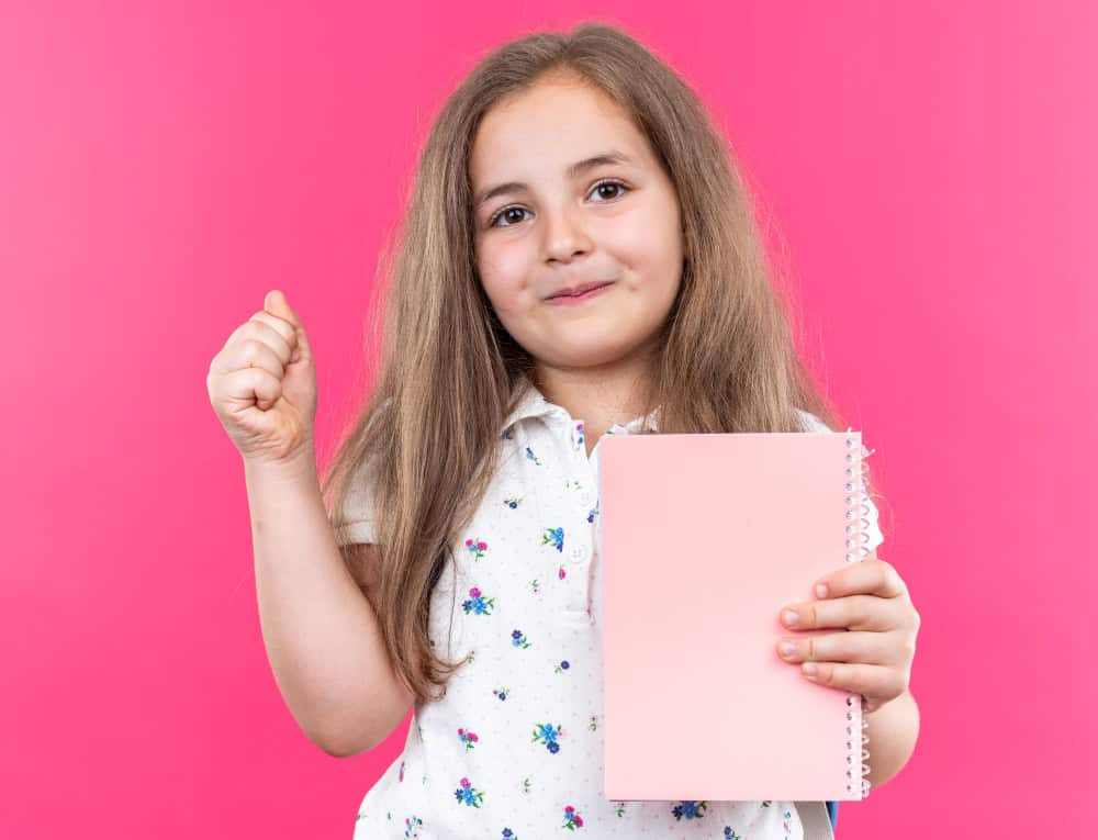 kid with diary