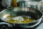 A pan with oil in the kitchen already used