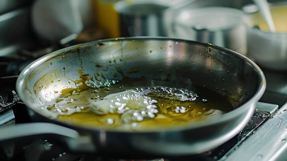 A pan with oil in the kitchen already used